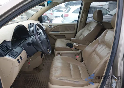 2010 Honda Odyssey Ex-L z USA, uszkodzony, nr VIN 5FNRL3H7XAB099429